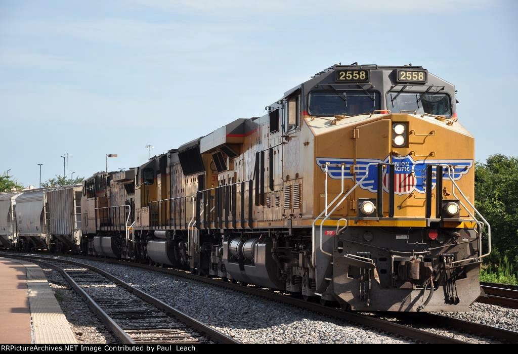 Sand train cruises west through the station